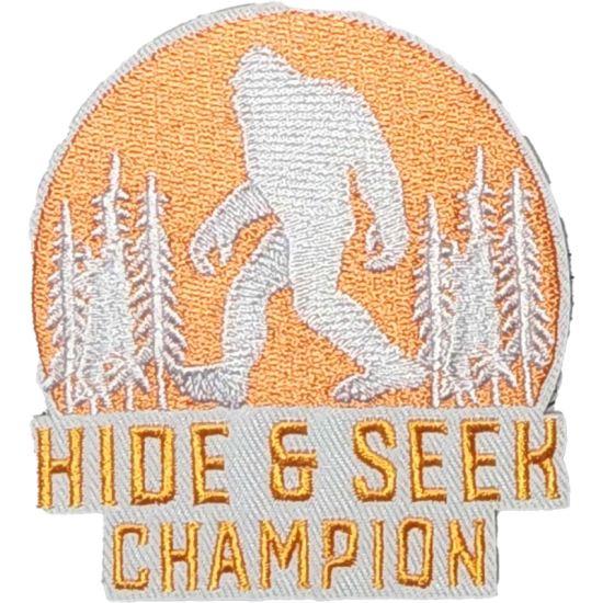 Orange White Gray Outline Bigfoot with Text HIDE & SEEK CHAMPION I/O