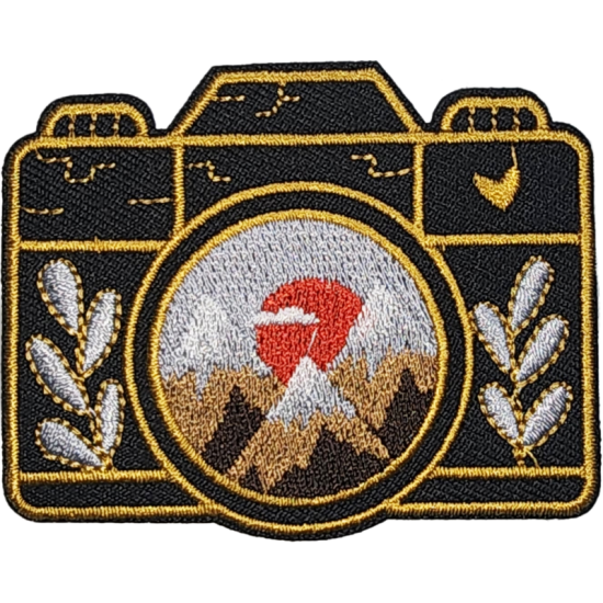 Black Gold Outline Camera with Mountains and Sun I/O