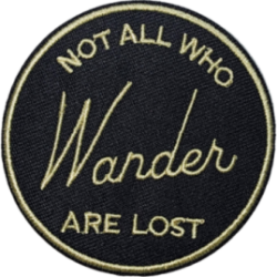 Black Gold Outline Circle Patch with Text Not All Who Wander Are Lost I/O