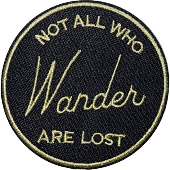 Black Gold Outline Circle Patch with Text Not All Who Wander Are Lost I/O